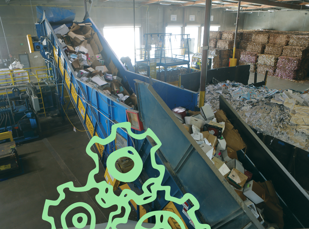 cardboard of all shapes and sizes flowing through a machine