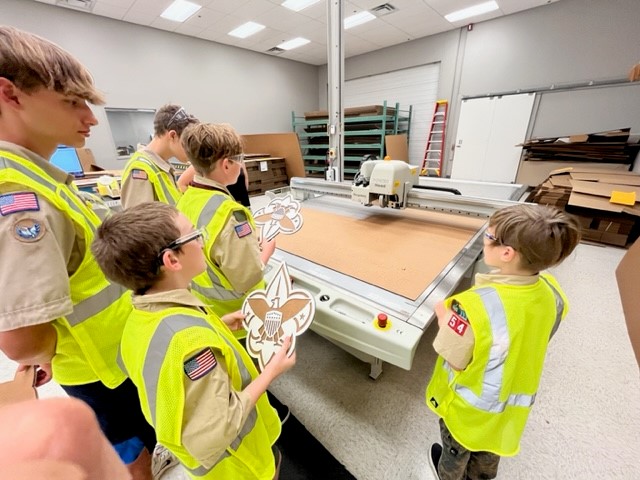 Cedar River, Iowa Boy Scouts get a tour of a corrugated box design lab