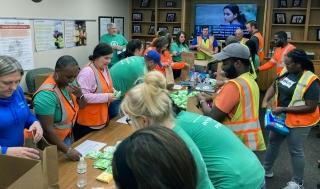 IP volunteers pack hygiene kits